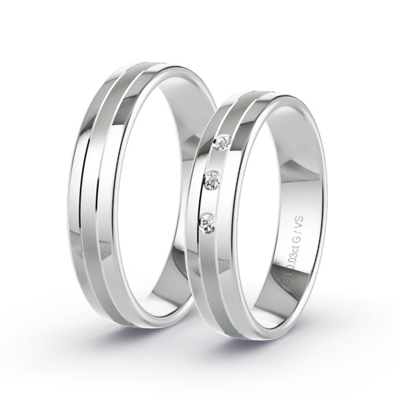 Obrączki ślubne Białe złoto - 0.03 ct diamentem - Model N°1006 Obrączki ślubne Białe złoto - 0.03 ct diamentem - Model N°1006