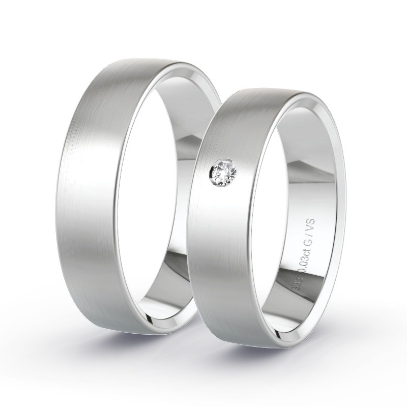 Obrączki ślubne Białe złoto - 0.03 ct diamentem - Model N°1104 Obrączki ślubne Białe złoto - 0.03 ct diamentem - Model N°1104