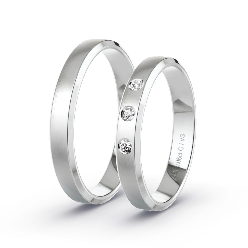 Obrączki ślubne Białe złoto - 0.06 ct diamentem - Model N°1603 Obrączki ślubne Białe złoto - 0.06 ct diamentem - Model N°1603