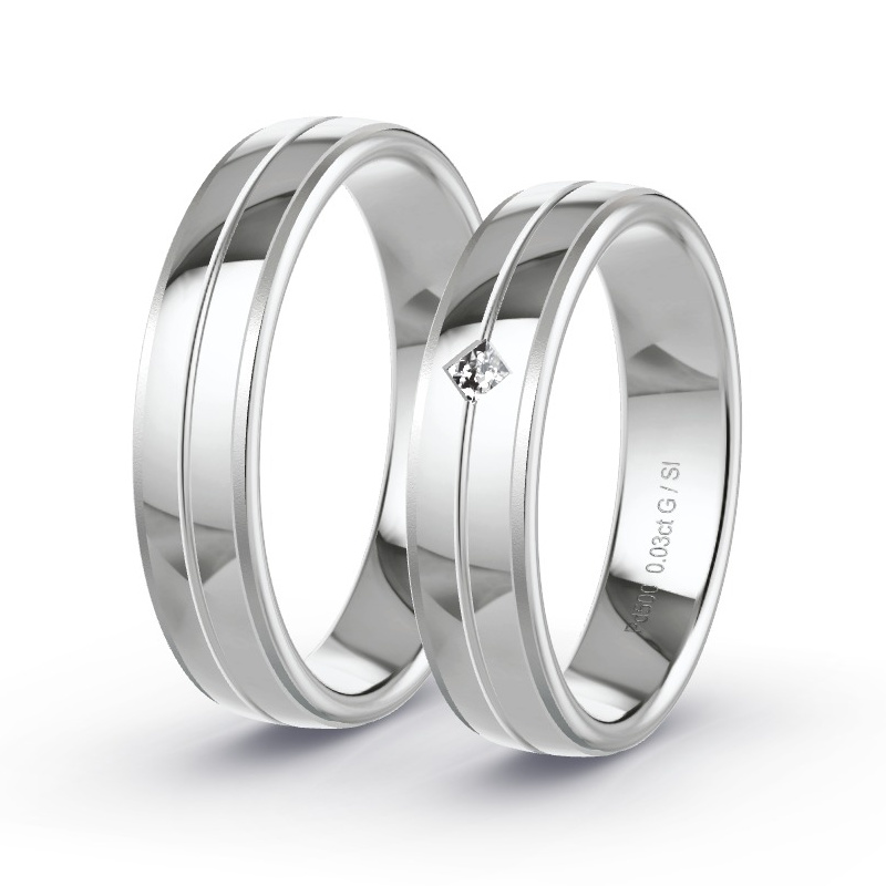 Obrączki ślubne Pallad - 0.03 ct diamentem - Model N°1606 Obrączki ślubne Pallad - 0.03 ct diamentem - Model N°1606