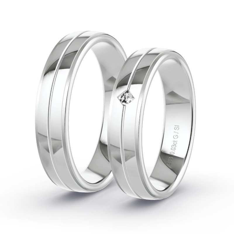 Obrączki ślubne Białe złoto - 0.03 ct diamentem - Model N°1606 Obrączki ślubne Białe złoto - 0.03 ct diamentem - Model N°1606