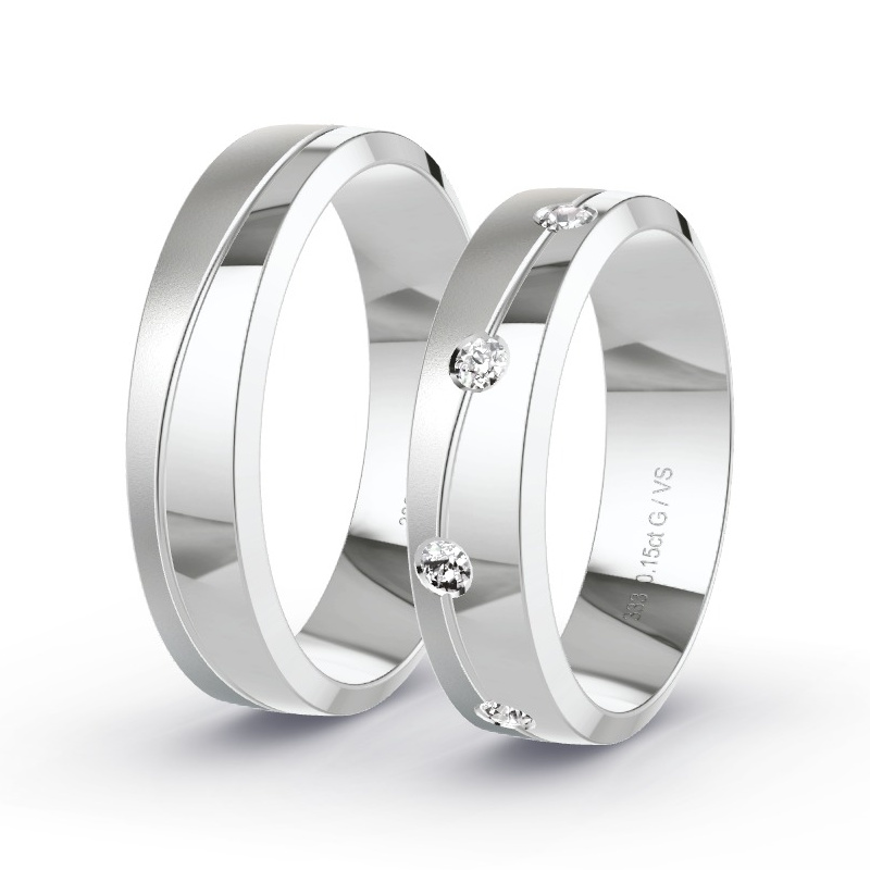 Obrączki ślubne Białe złoto - 0.18 ct diamentem - Model N°1624 Obrączki ślubne Białe złoto - 0.18 ct diamentem - Model N°1624