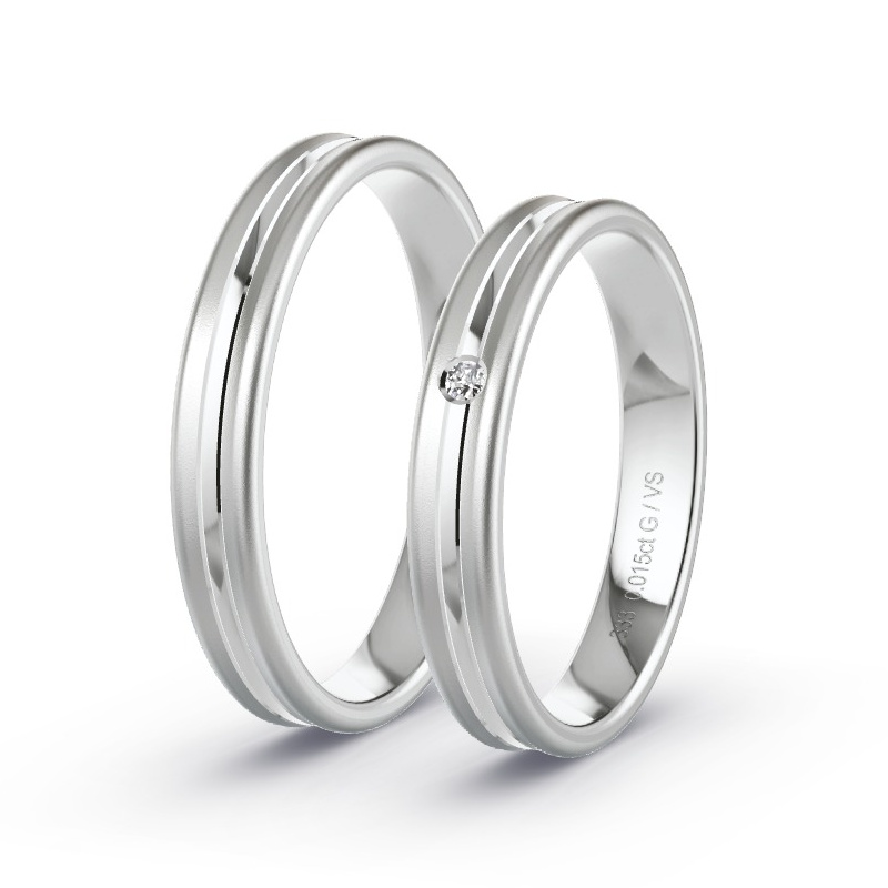 Obrączki ślubne Białe złoto - 0.015 ct diamentem - Model N°1639 Obrączki ślubne Białe złoto - 0.015 ct diamentem - Model N°1639