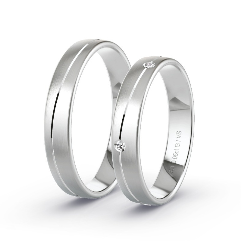 Obrączki ślubne Białe złoto - 0.05 ct diamentem - Model N°1649 Obrączki ślubne Białe złoto - 0.05 ct diamentem - Model N°1649