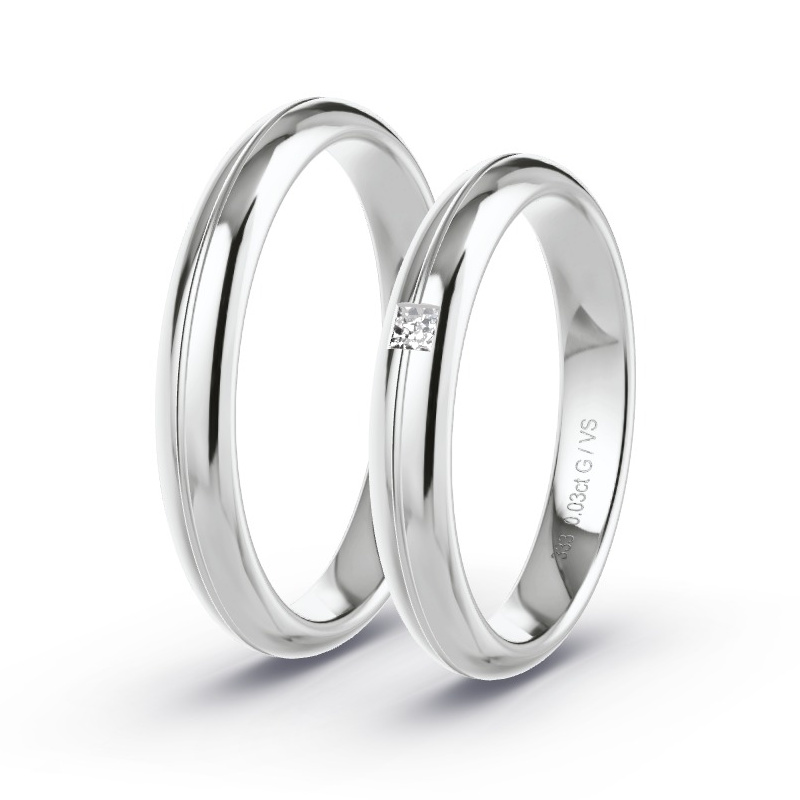 Obrączki ślubne Białe złoto - 0.03 ct diamentem - Model N°1651 Obrączki ślubne Białe złoto - 0.03 ct diamentem - Model N°1651