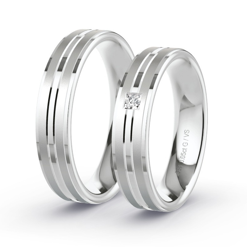 Obrączki ślubne Białe złoto - 0.05 ct diamentem - Model N°1653 Obrączki ślubne Białe złoto - 0.05 ct diamentem - Model N°1653