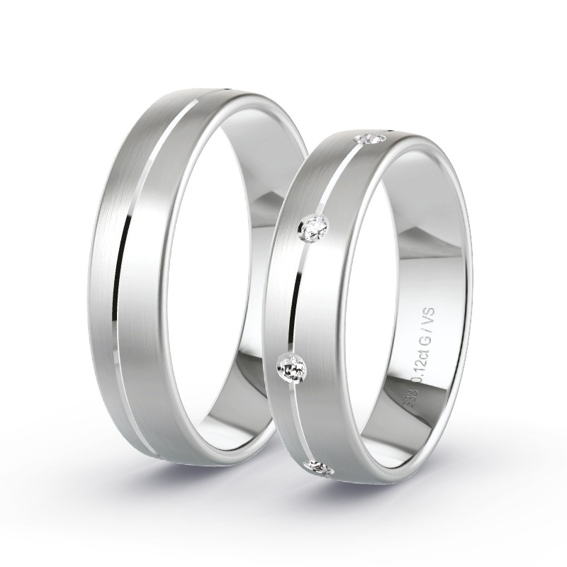 Obrączki ślubne Białe złoto - 0.12 ct diamentem - Model N°1659 Obrączki ślubne Białe złoto - 0.12 ct diamentem - Model N°1659