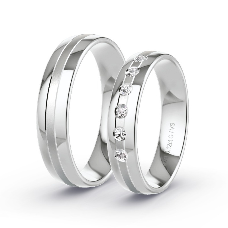 Obrączki ślubne Białe złoto - 0.12 ct diamentem - Model N°1675 Obrączki ślubne Białe złoto - 0.12 ct diamentem - Model N°1675