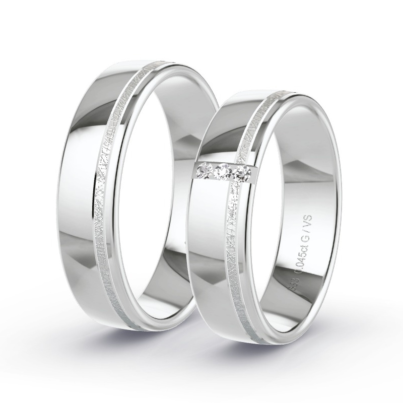 Obrączki ślubne Białe złoto - 0.045 ct diamentem - Model N°1680 Obrączki ślubne Białe złoto - 0.045 ct diamentem - Model N°1680