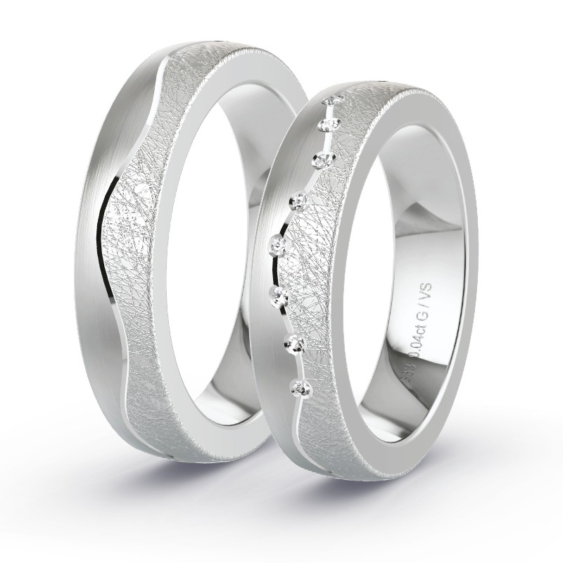 Obrączki ślubne Białe złoto - 0.04 ct diamentem - Model N°1691 Obrączki ślubne Białe złoto - 0.04 ct diamentem - Model N°1691