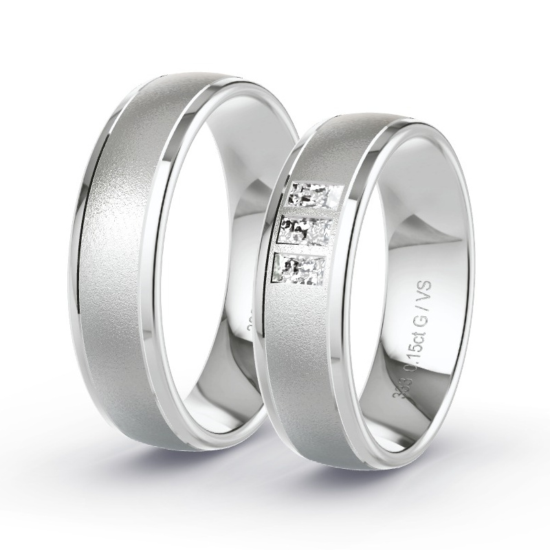 Obrączki ślubne Białe złoto - 0.15 ct diamentem - Model N°1695 Obrączki ślubne Białe złoto - 0.15 ct diamentem - Model N°1695