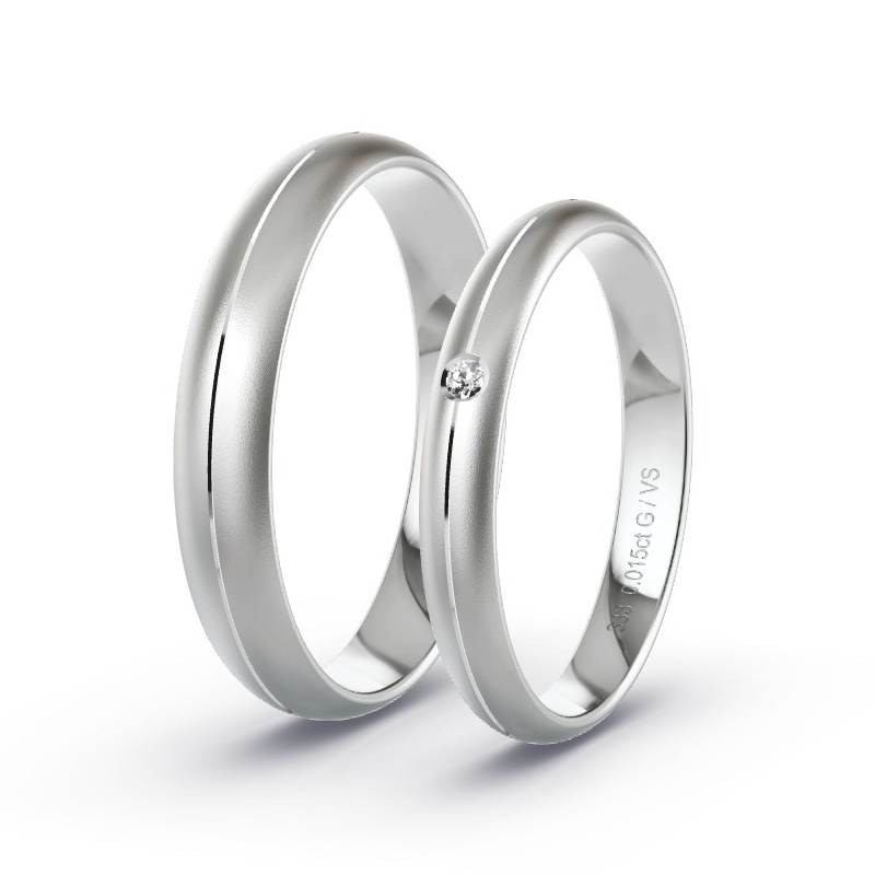 Obrączki ślubne Białe złoto - 0.015 ct diamentem - Model N°1704 Obrączki ślubne Białe złoto - 0.015 ct diamentem - Model N°1704