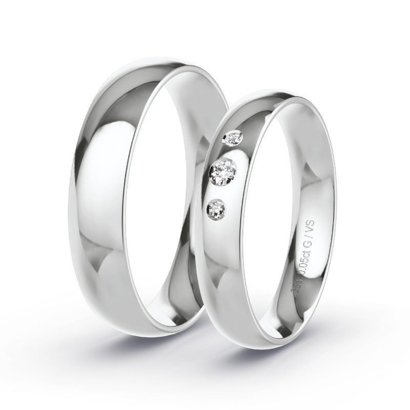 Obrączki ślubne Białe złoto - 0.05 ct diamentem - Model N°1709 Obrączki ślubne Białe złoto - 0.05 ct diamentem - Model N°1709