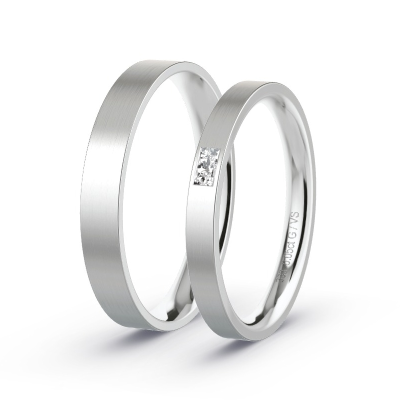 Obrączki ślubne Białe złoto - 0.05 ct diamentem - Model N°1721 Obrączki ślubne Białe złoto - 0.05 ct diamentem - Model N°1721